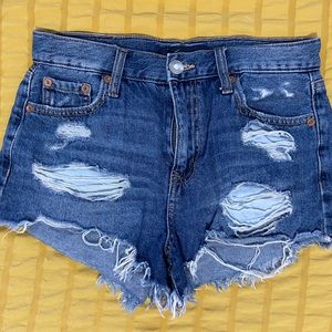 Three pairs of size 0 cut off Jean shorts.